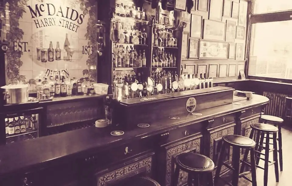 Party Cities Europe - The beautiful interior of McDaids Pub in Dublin.