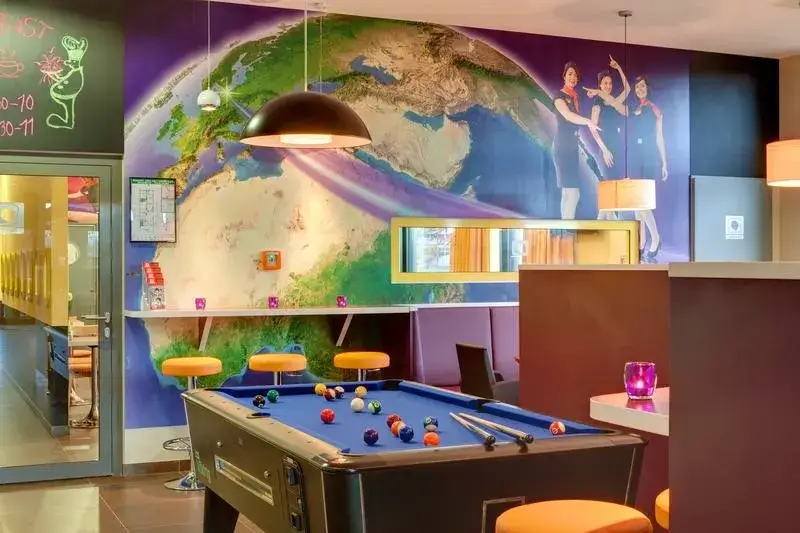 Best Hostels in Germany - MEININGER Frankfurt Main Airport Lounge Area